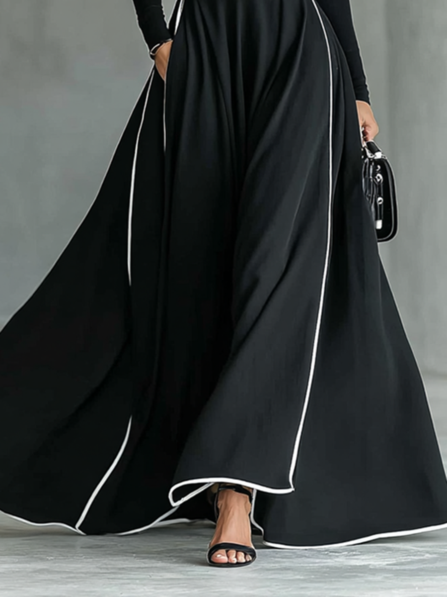 Gina – Vestido maxi para mujer negro con costuras blancas y cuello alto, mangas largas y cintura entallada